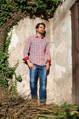Male model sitting with legs crossed