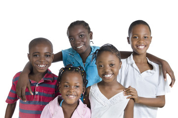 Five happy african kids holding one another