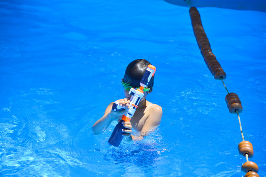 Water pistoling in a pool