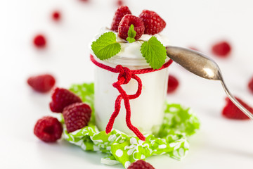 Raspberries and yoghurt or clotted cream