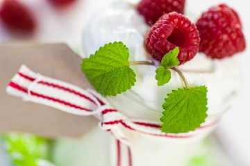 Raspberries and yoghurt or clotted cream