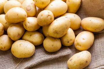 Farm fresh  potatoes on a hessian sack