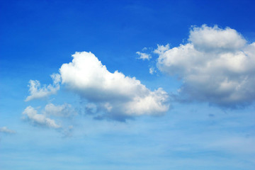 Clouds on the blue sky.
