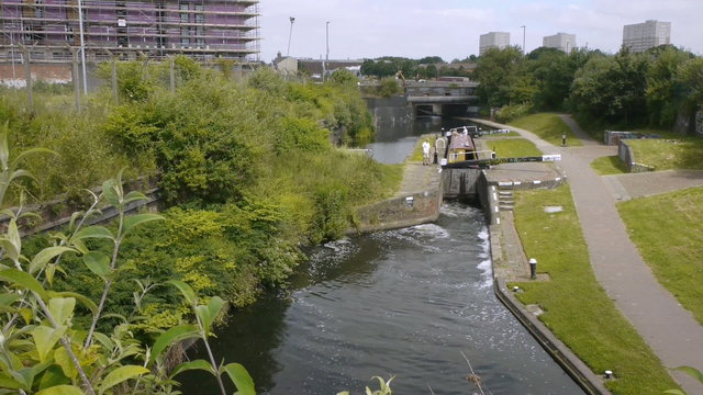 Canal boat in a lock in Birmingham, England.