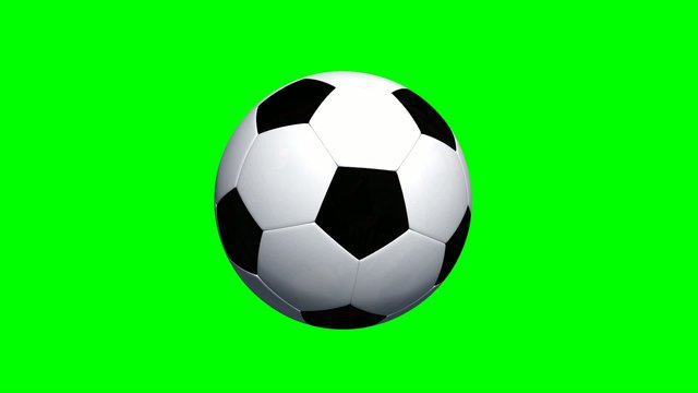 Soccer ball flying at cam - green screen