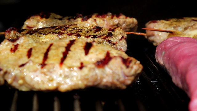 Meat fried on a grill.Pork steak, grilled on an open fire.