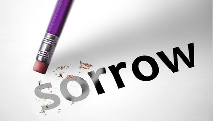Eraser deleting the word Sorrow