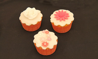 Three Pretty Individual Home Made Cup Cakes.