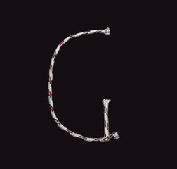 Letter g on black background
