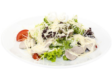 meat salad with cheese and herbs on a white plate