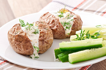 Baked potato filled with sour cream