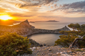 Seascape at sunrise in the mountains