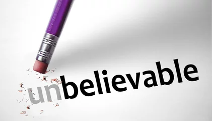 Foto op Plexiglas Eraser changing the word Unbelievable for Believable © klublu