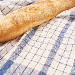 Baguette bread over the towel