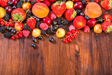 fresh berries on wooden table