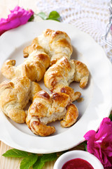 Homemade croissants with rose jam