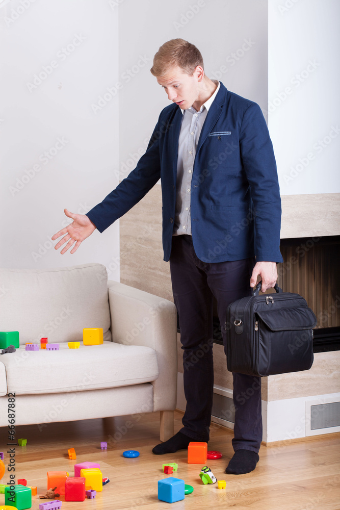 Wall mural angry businessman coming back home