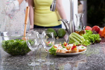 Wine glasses and food for a party