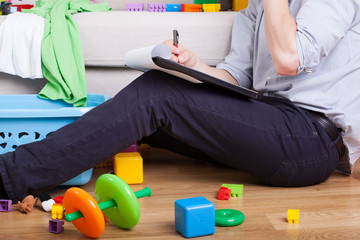 Young father working at home