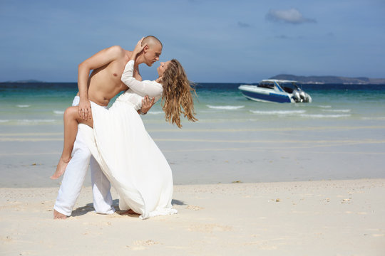 Man and woman in love on the beach