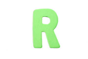 Alphabet of color wood isolated on white.