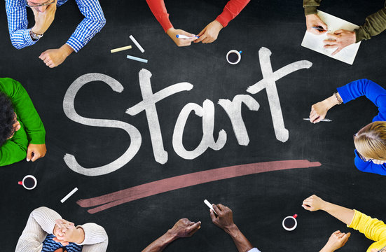 Group of Diverse People Brainstorming About "Start"