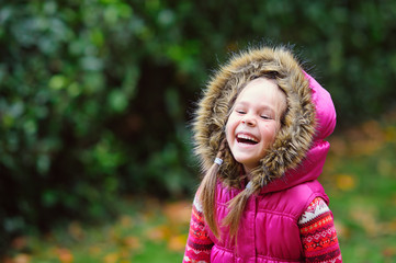 cute girl at autumn day in the park