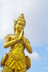 Fototapeta premium Kinnaree; Mythical female bird with a human head at the temple