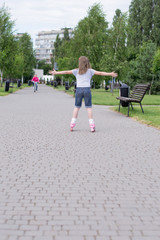 little girl on roller skates