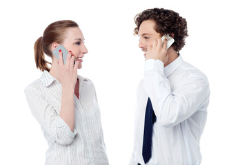 Business executives engaged over a phone call