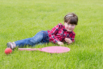 Fototapeta premium little girl on the grass