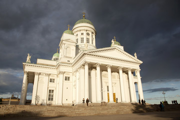 Fototapeta na wymiar people leaving helsinki cathedral in the evening after concert