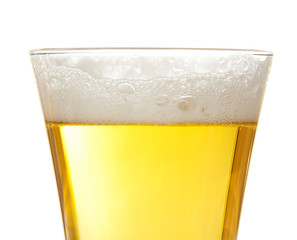 The glass of fresh light beer