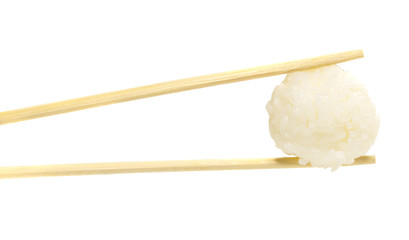 Rice ball in chopsticks isolatedl on white background