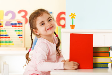 laughing girl with books