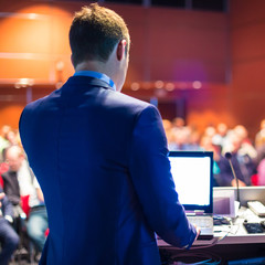 Speaker at Business Conference and Presentation.