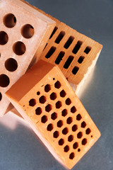 Bricks on metallic background