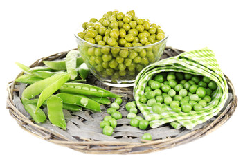 Fresh  and canned peas in glass bowl