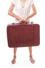 vintage suitcase in female hands