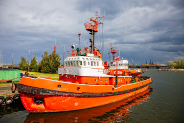 Tugboats on a dreary and overcast day in port