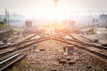 Plakat Cargo train platform at sunset with container