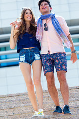 Obraz premium Portrait of young couple in love on the street