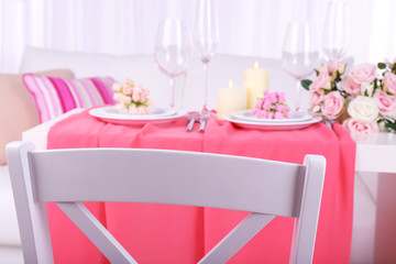 Festive table setting in interior