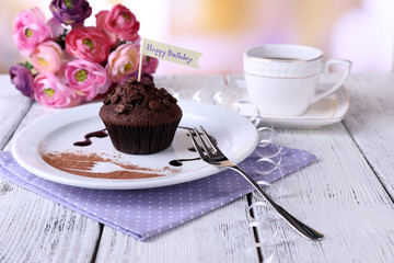 Chocolate muffin with chocolate sauce