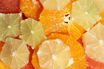 Sliced citrus fruits background