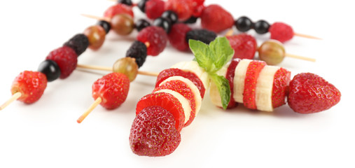 Fresh fruit kebabs for healthy snack isolated on white