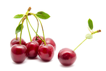 Juicy cherry with leaf isolated