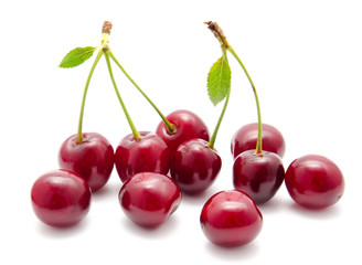 Juicy cherry with leaf isolated