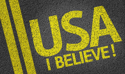 USA, I Believe! written on the road