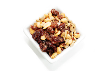 Raisins and Mixed Nuts in a White Square Bowl
